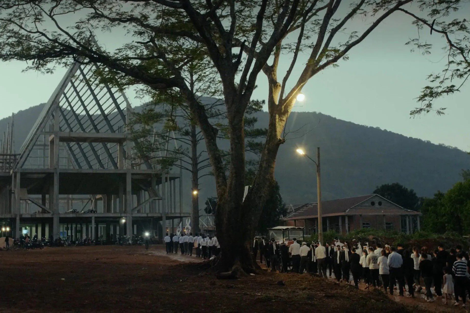 Some images from the film. What is in the Vietnamese film that won at Cannes 2023 lasting more than 3 hours? - Image 5.