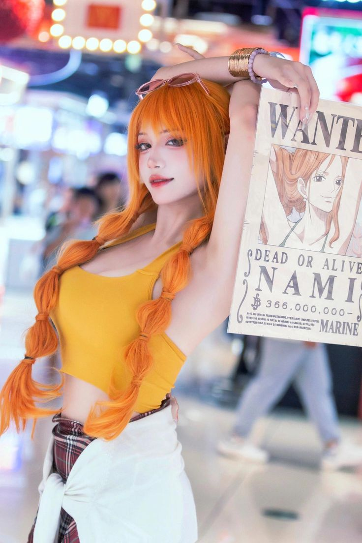 Cosplay Nami, when the One Piece goddess comes to life perfectly down to the millimeter 3 Cosplay Nami, capturing the essence of the character perfectly.